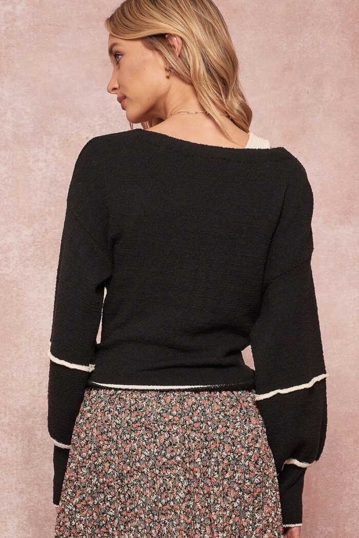 A textured knit cardigan sweater