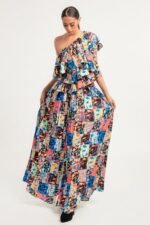 Printed Ruffle Top and Pleated Skirt Set in orange with adjustable styling options and functional pockets.