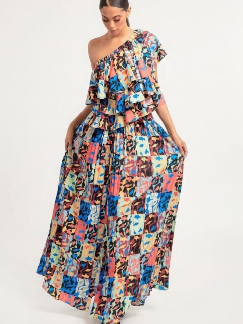 Printed Ruffle Top and Pleated Skirt Set in orange with adjustable styling options and functional pockets.