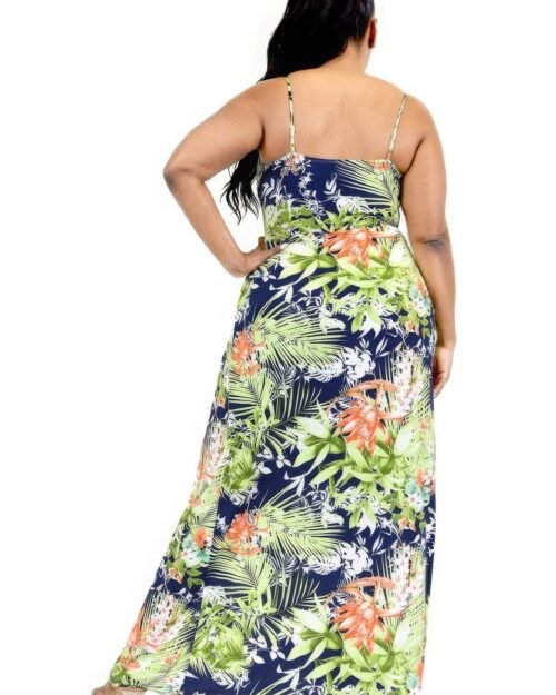 curvy women’s summer maxi dress with tropical leaf print. plus size tropical dress with surplice neckline. plus size tropical leaf print surplice maxi dress – front view