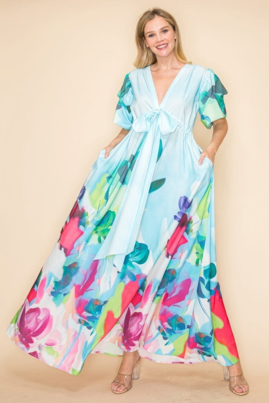 Printed v neck maxi dress with self-tie waist, v-neckline, and practical pockets.