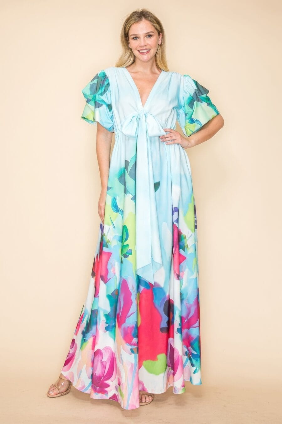 Printed v neck maxi dress with self-tie waist, v-neckline, and practical pockets.