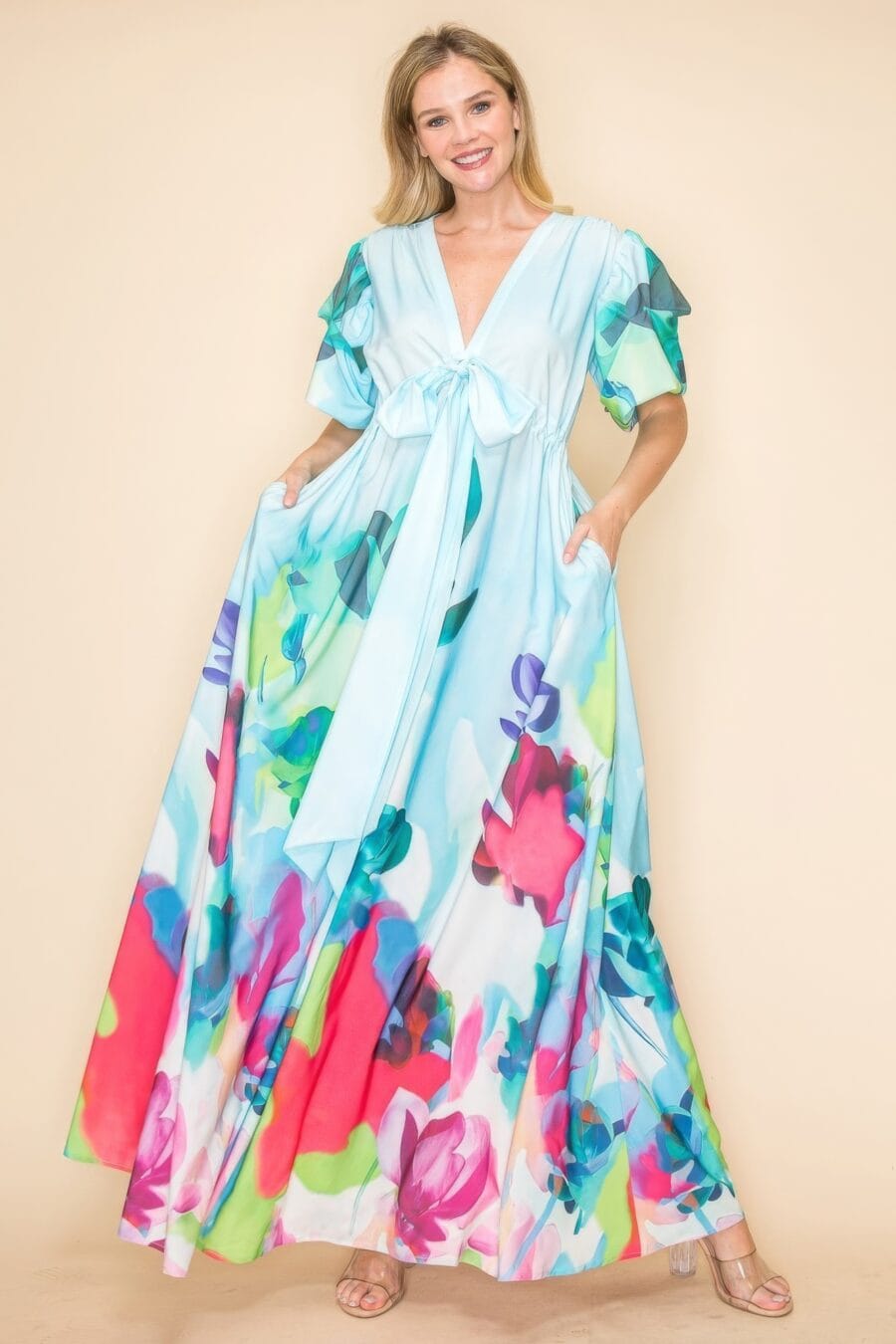 Printed v neck maxi dress with self-tie waist, v-neckline, and practical pockets.