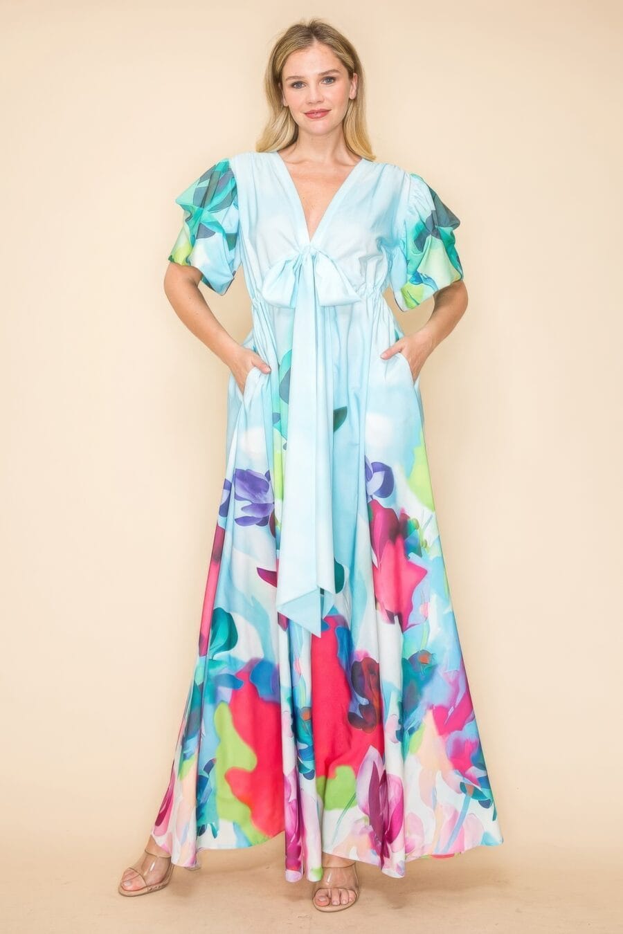 Printed v neck maxi dress with self-tie waist, v-neckline, and practical pockets.