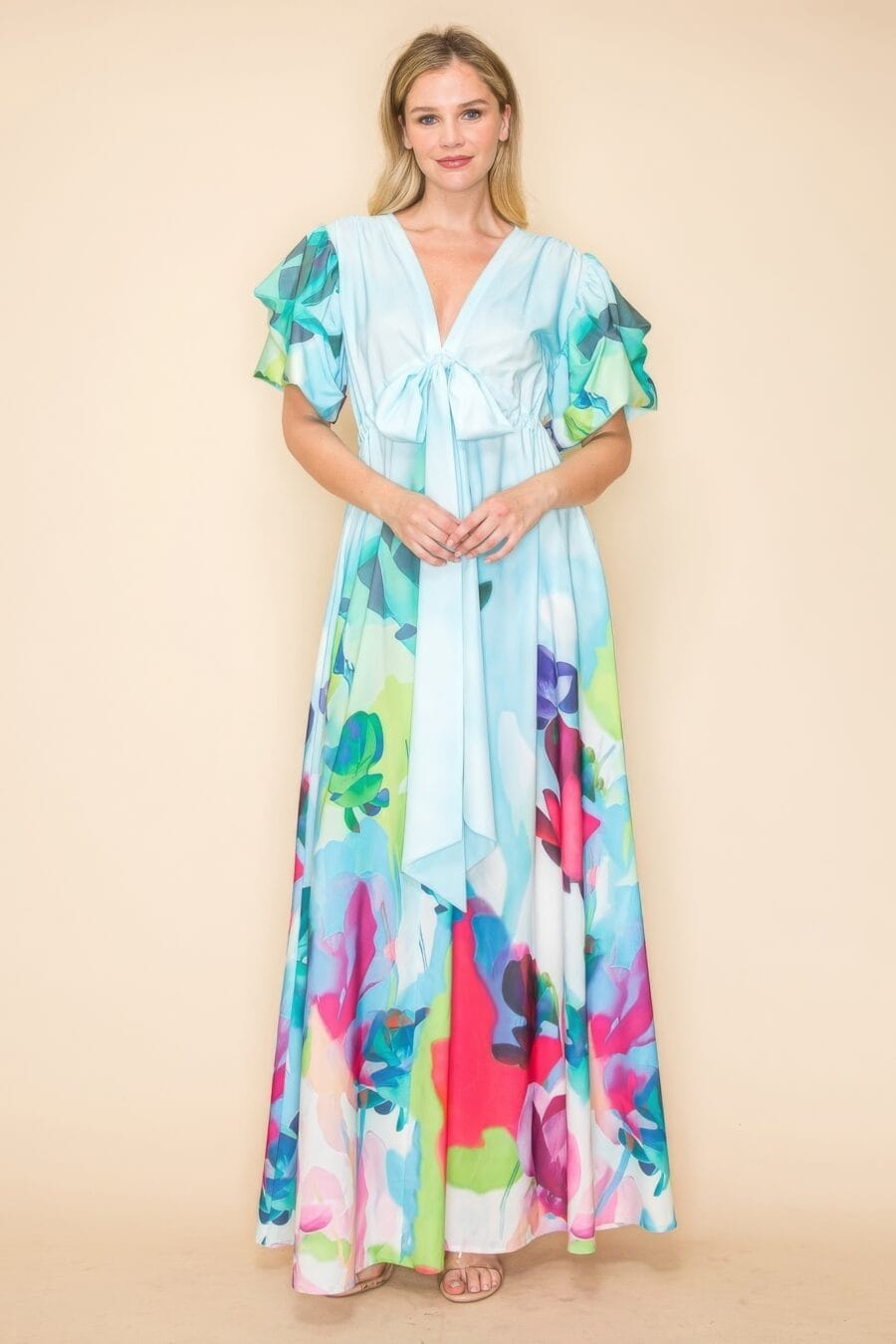 Printed v neck maxi dress with self-tie waist, v-neckline, and practical pockets.