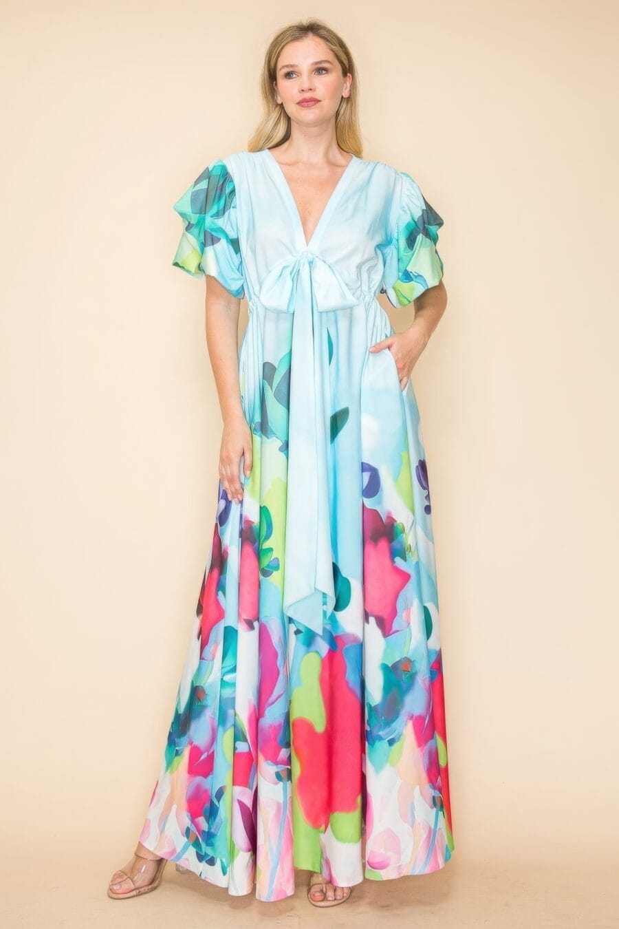 Printed v neck maxi dress with self-tie waist, v-neckline, and practical pockets.