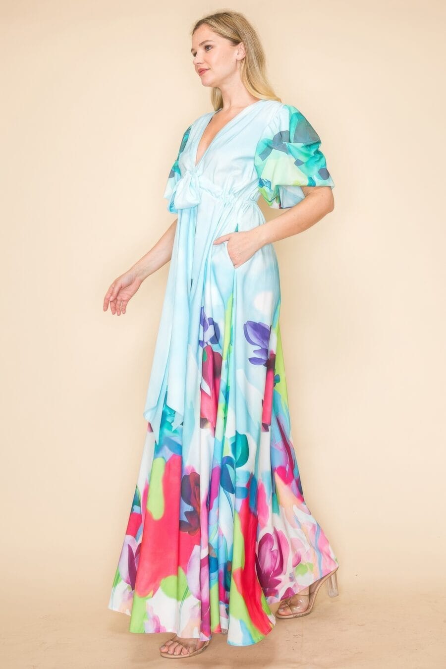 Printed v neck maxi dress with self-tie waist, v-neckline, and practical pockets.