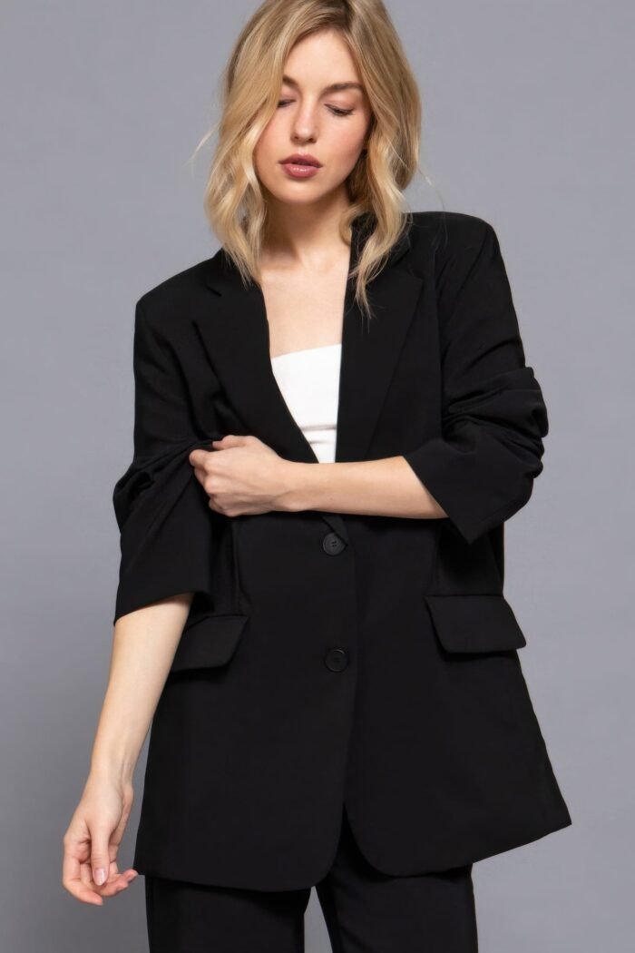 Women's taupe blazer with front button closure