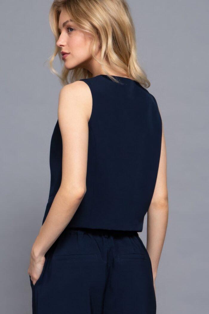 V-neckline w/front button closure vest