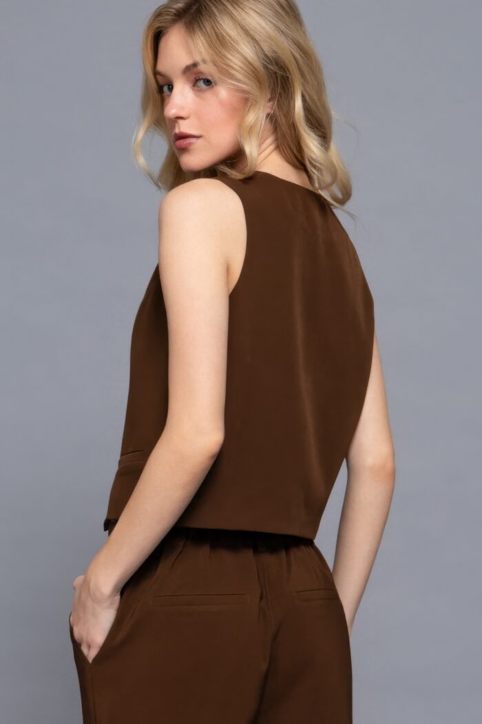V-neckline w/front button closure vest