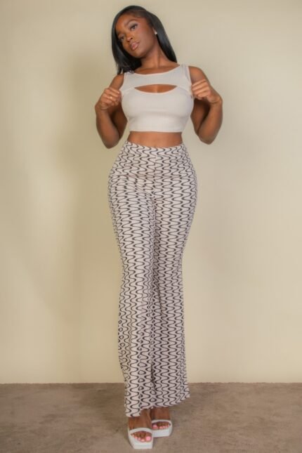 Back view of women’s cut out crop top paired leggings