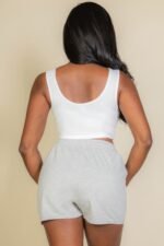 White summer crop top with ribbed texture and bold cut-out