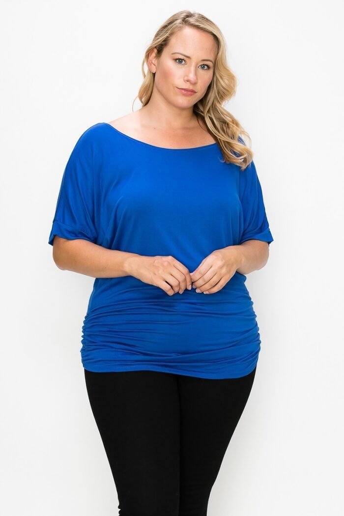 Short sleeve top featuring a round neck and ruched sides