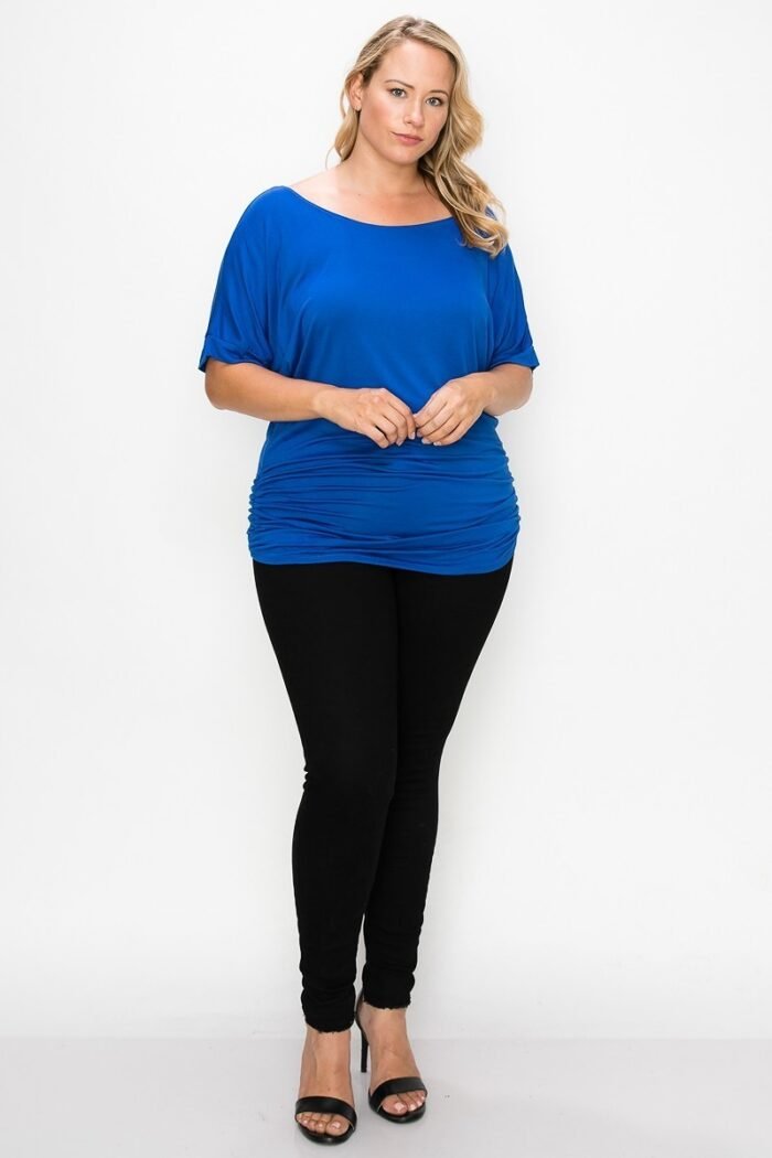 Short sleeve top featuring a round neck and ruched sides