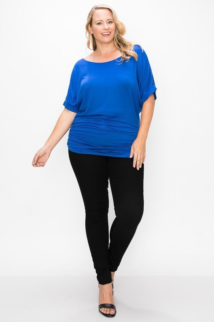 Short sleeve top featuring a round neck and ruched sides
