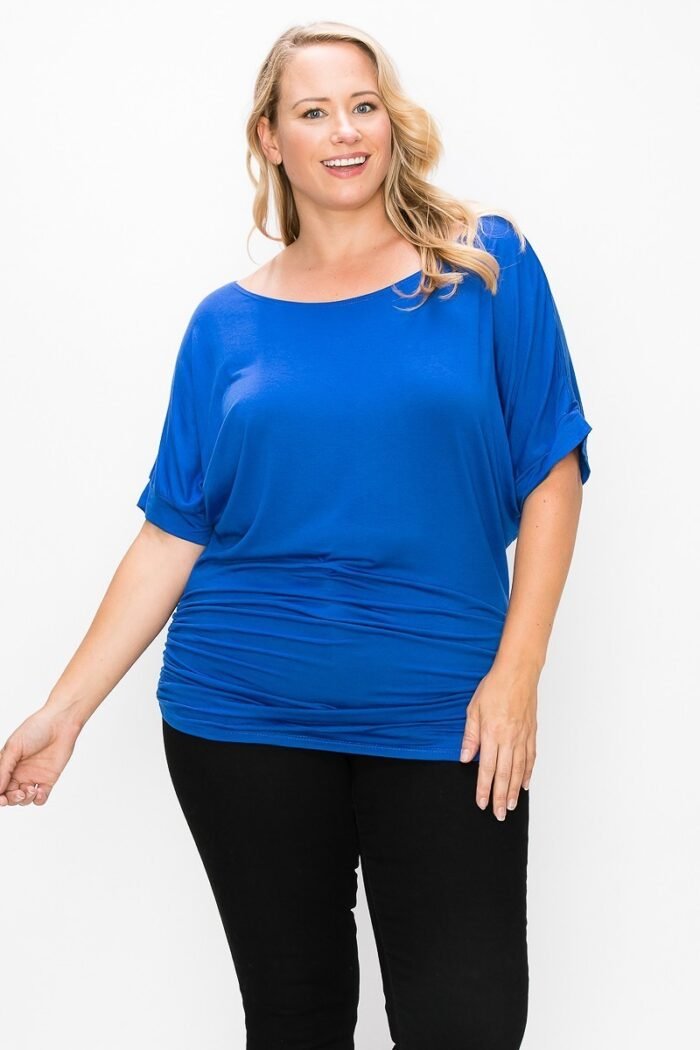 Short sleeve top featuring a round neck and ruched sides