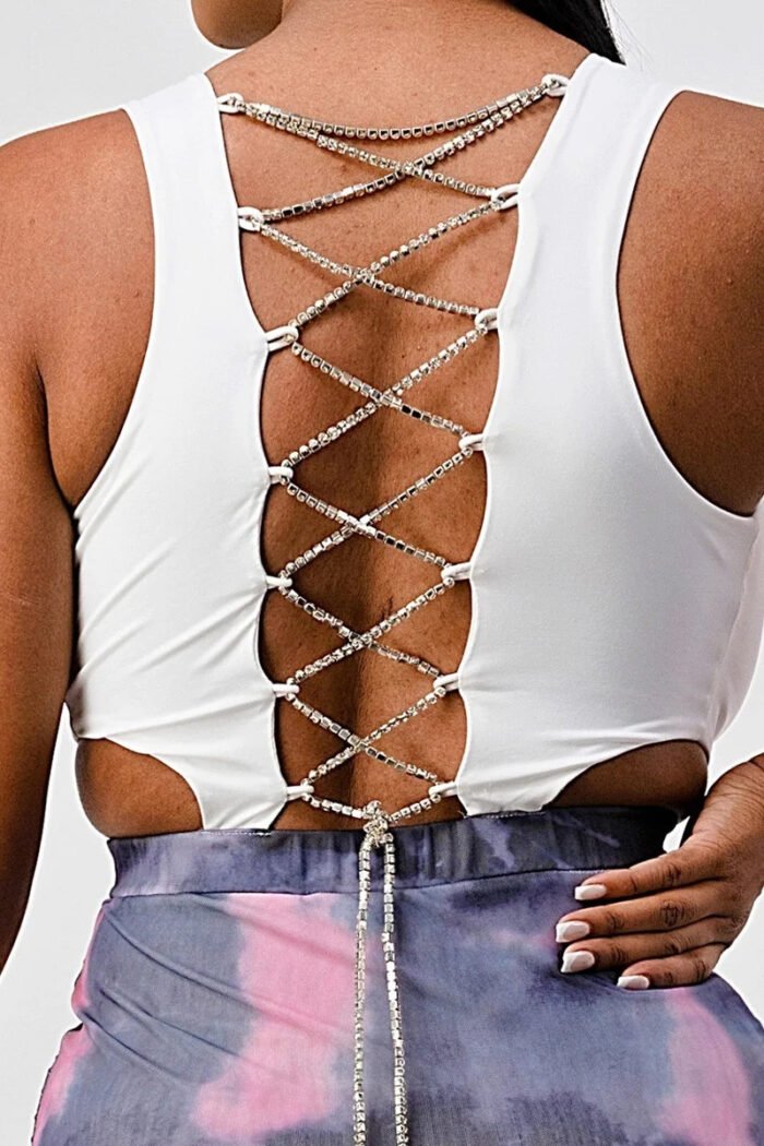 White sleeveless top with detachable rhinestone cross open back with bodycon...