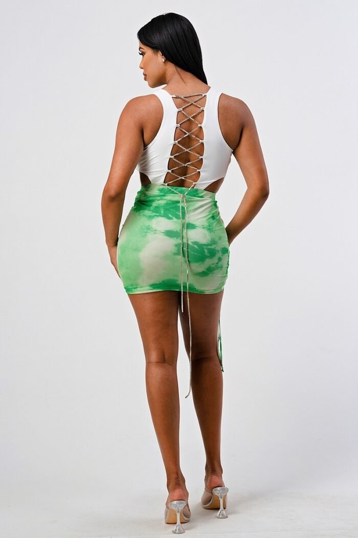 White sleeveless top with detachable rhinestone cross open back with bodycon...