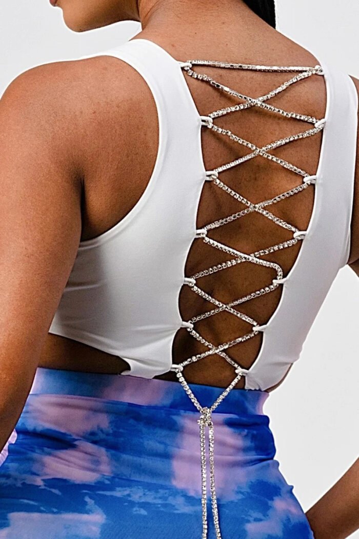 White sleeveless top with detachable rhinestone cross open back with bodycon...