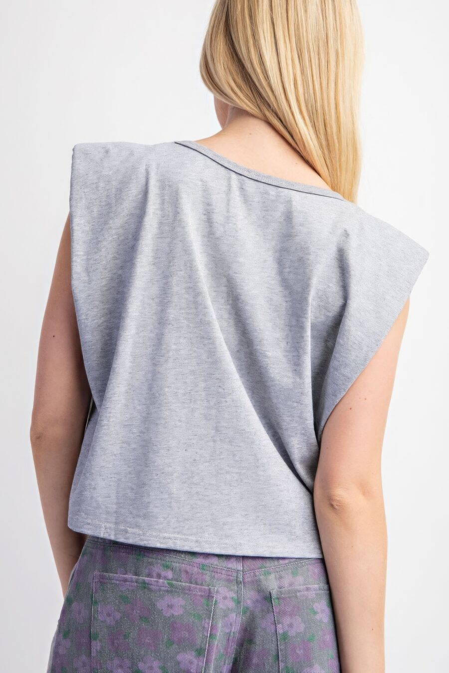 Sleeveless crop top with shoulder pads