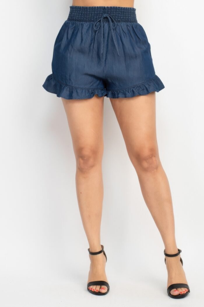 Smocked waist ruffled denim shorts – mini-length, stretchy denim shorts with a ruffled hem and adjustable drawstring for a chic summer look.