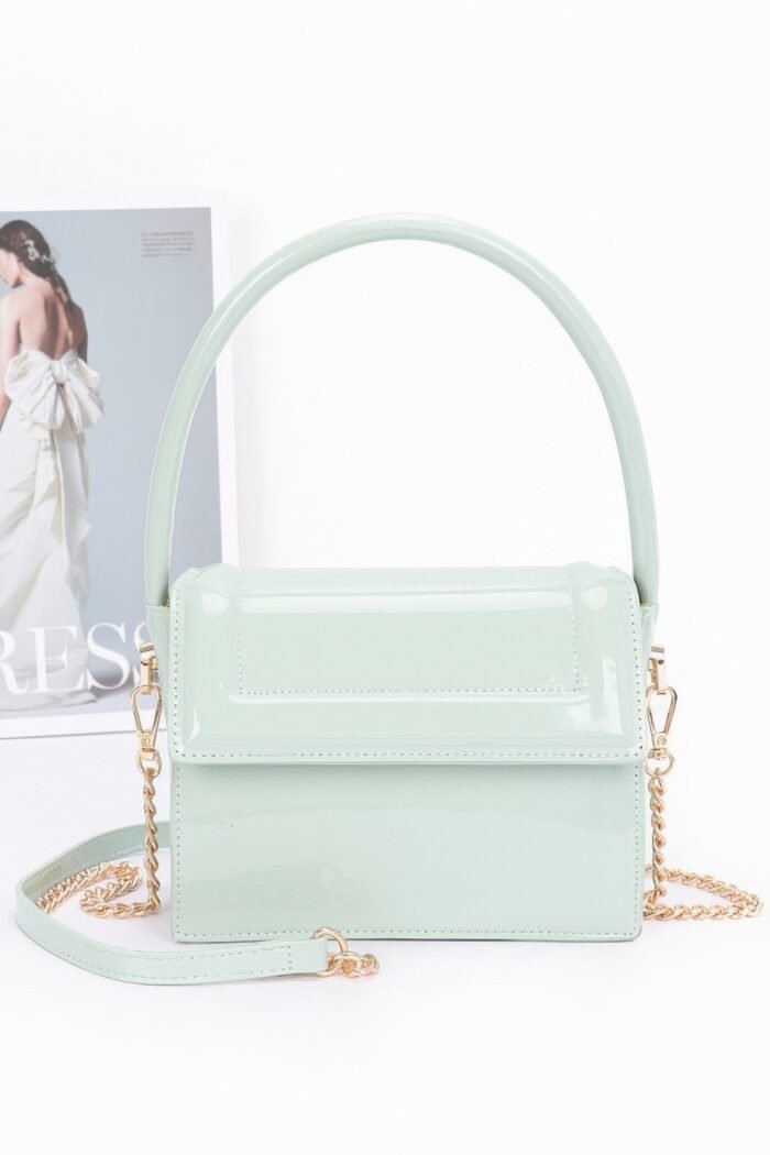 Enamel top handle flap bag