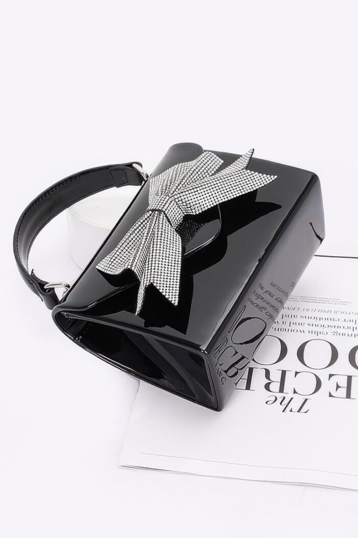 Enamel rhinestone ribbon top handle clutch