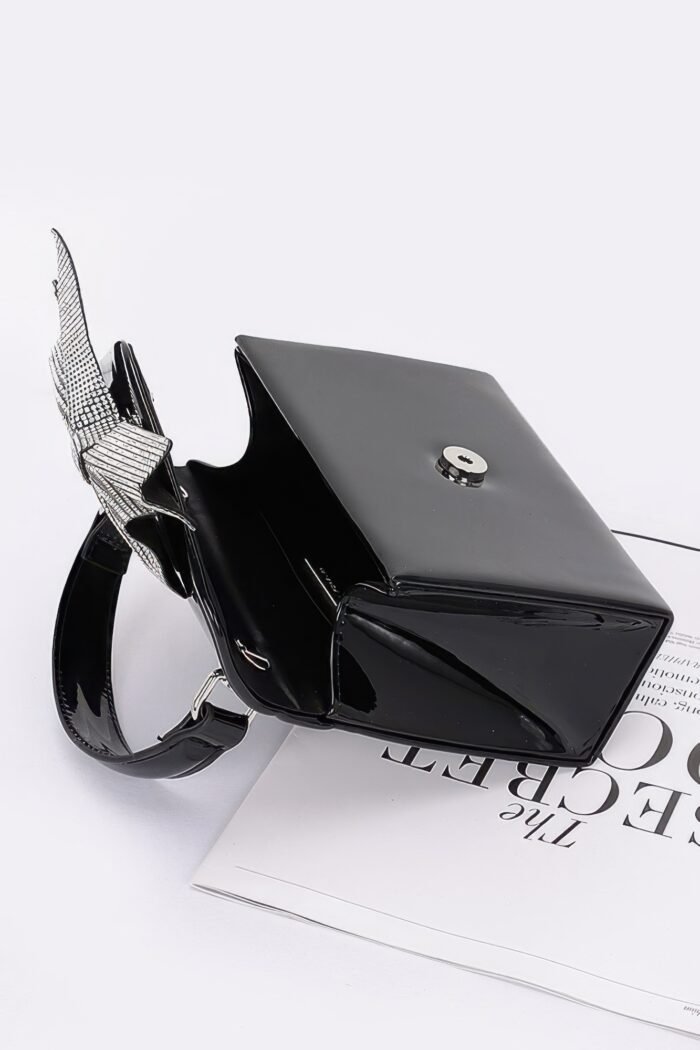 Enamel rhinestone ribbon top handle clutch