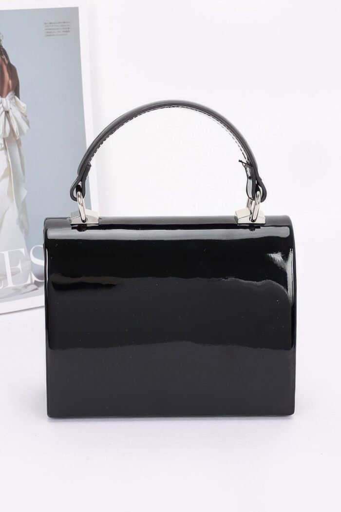 Enamel rhinestone ribbon top handle clutch
