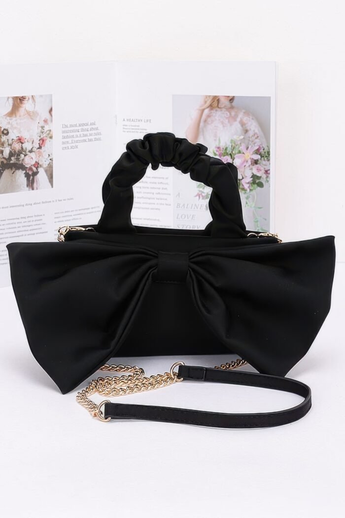 Nylon top handle bag with bow front clutch