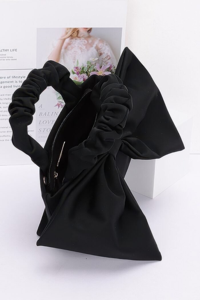 Nylon top handle bag with bow front clutch
