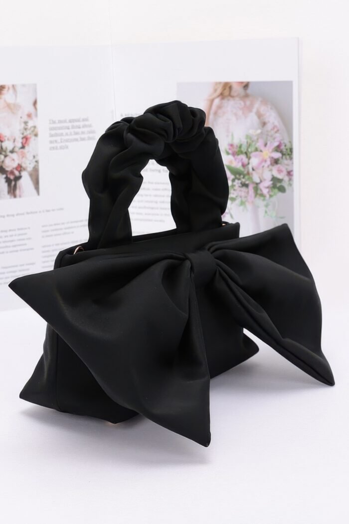 Nylon top handle bag with bow front clutch