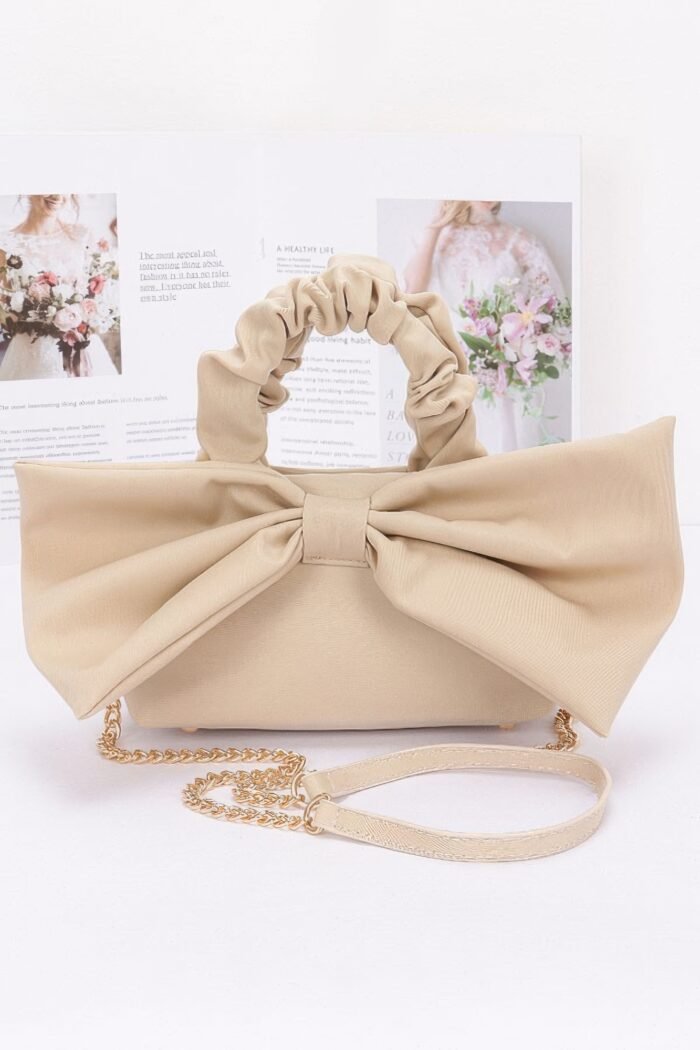 Nylon top handle bag with bow front clutch