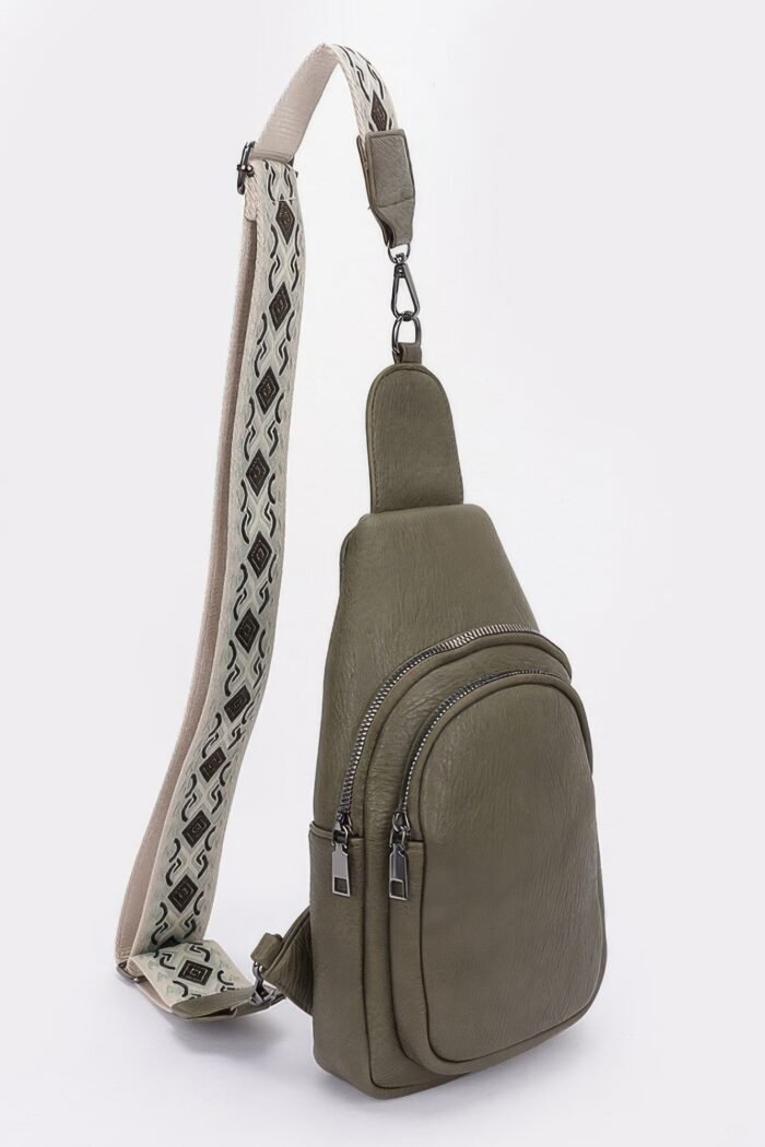 Faux leather sling bag w/multi color strap