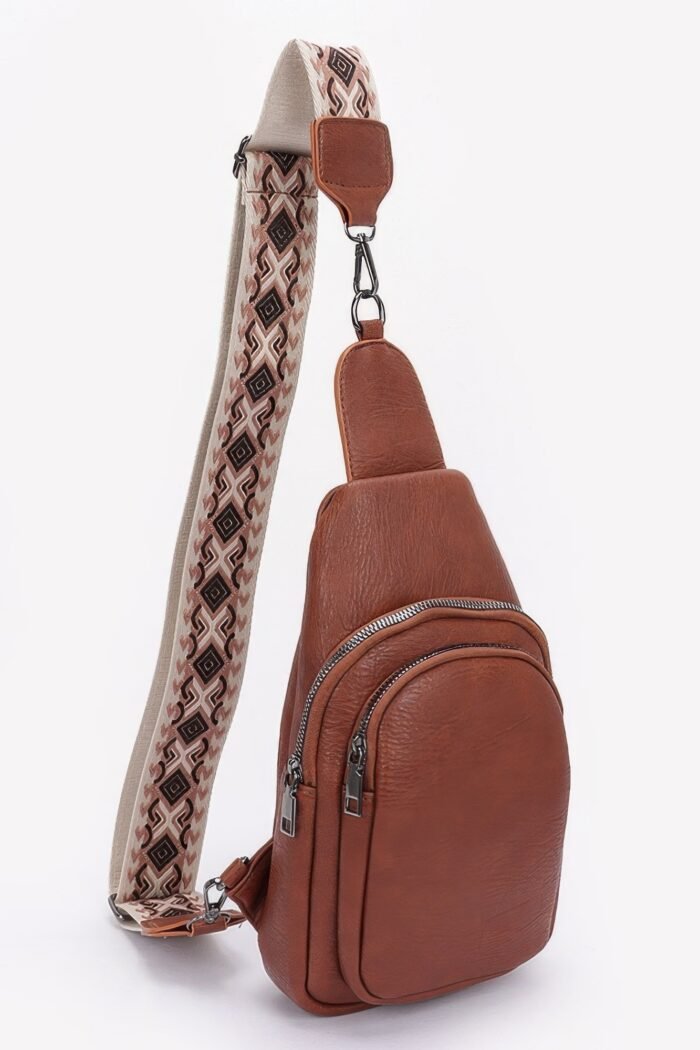 Faux leather sling bag w/multi color strap