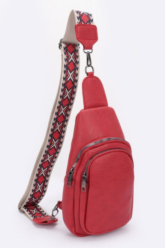 Faux leather sling bag w/multi color strap