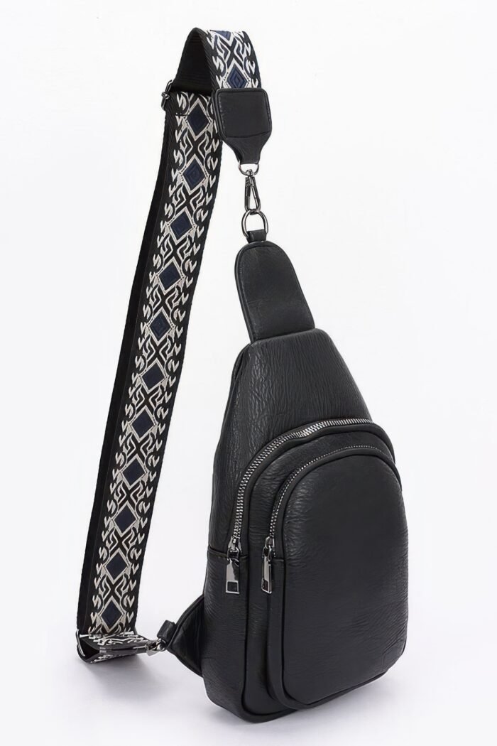 Faux leather sling bag w/multi color strap