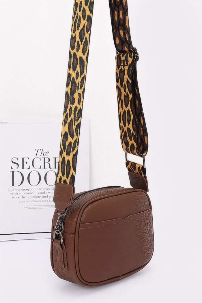 Faux leather camera bag w/leopard strap