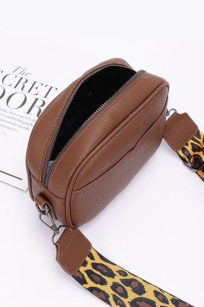 Faux leather camera bag w/leopard strap