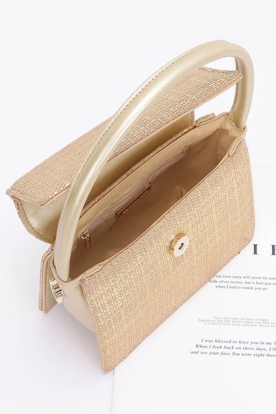 Metallic faux straw top handle bag