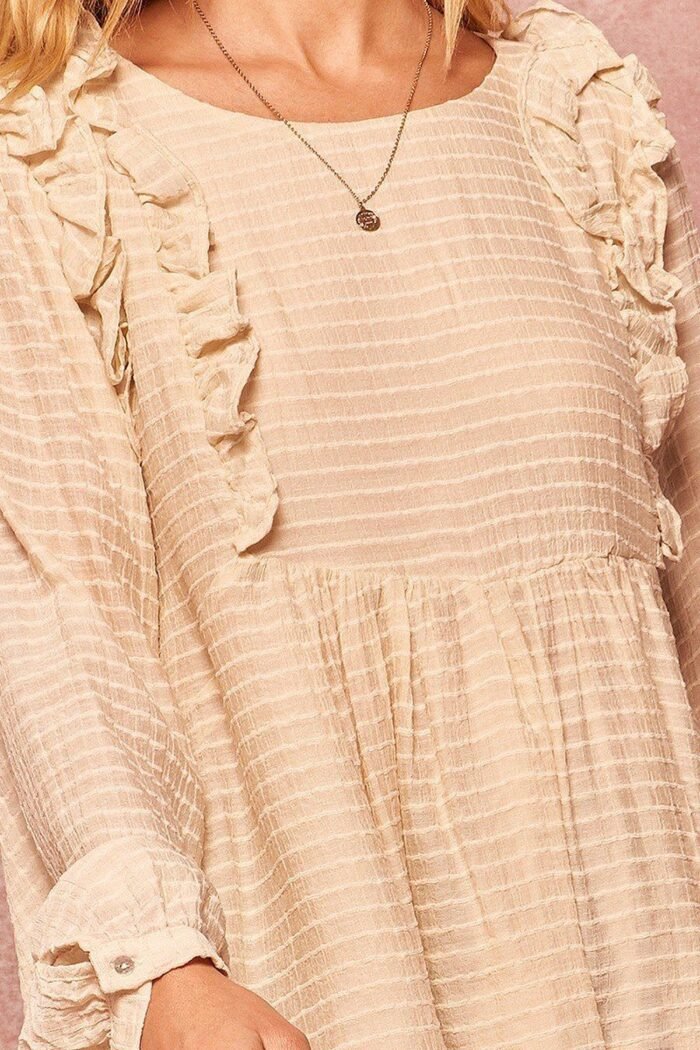 A semi-sheer striped woven top