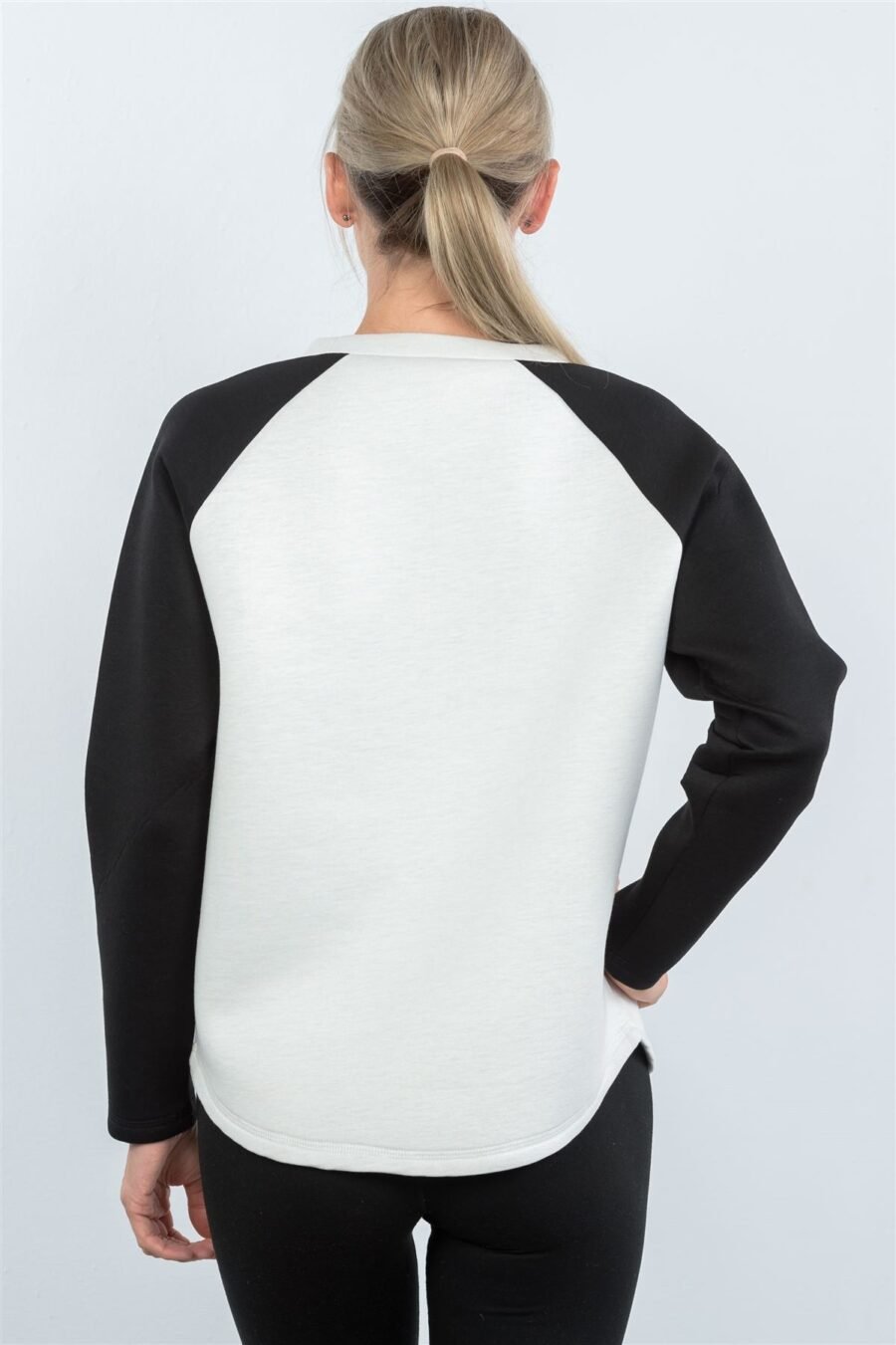 Contrast sleeve curved hem sweater