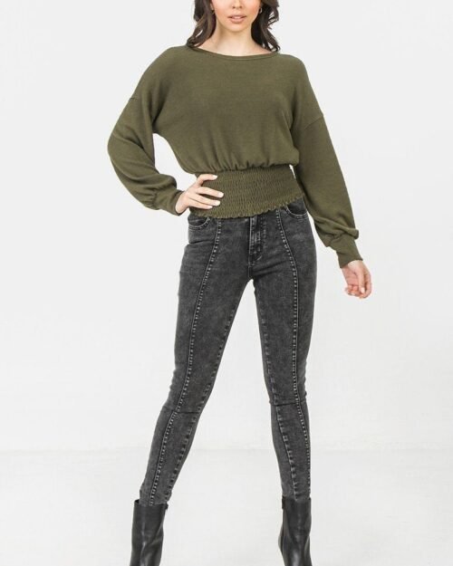 a knit top featuring wide neckline