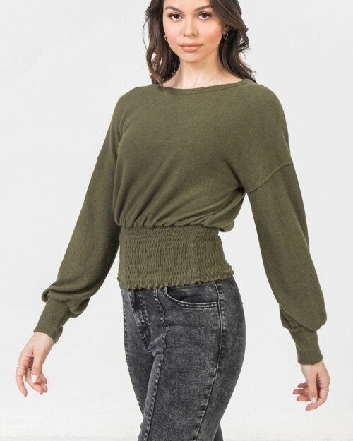 a knit top featuring wide neckline