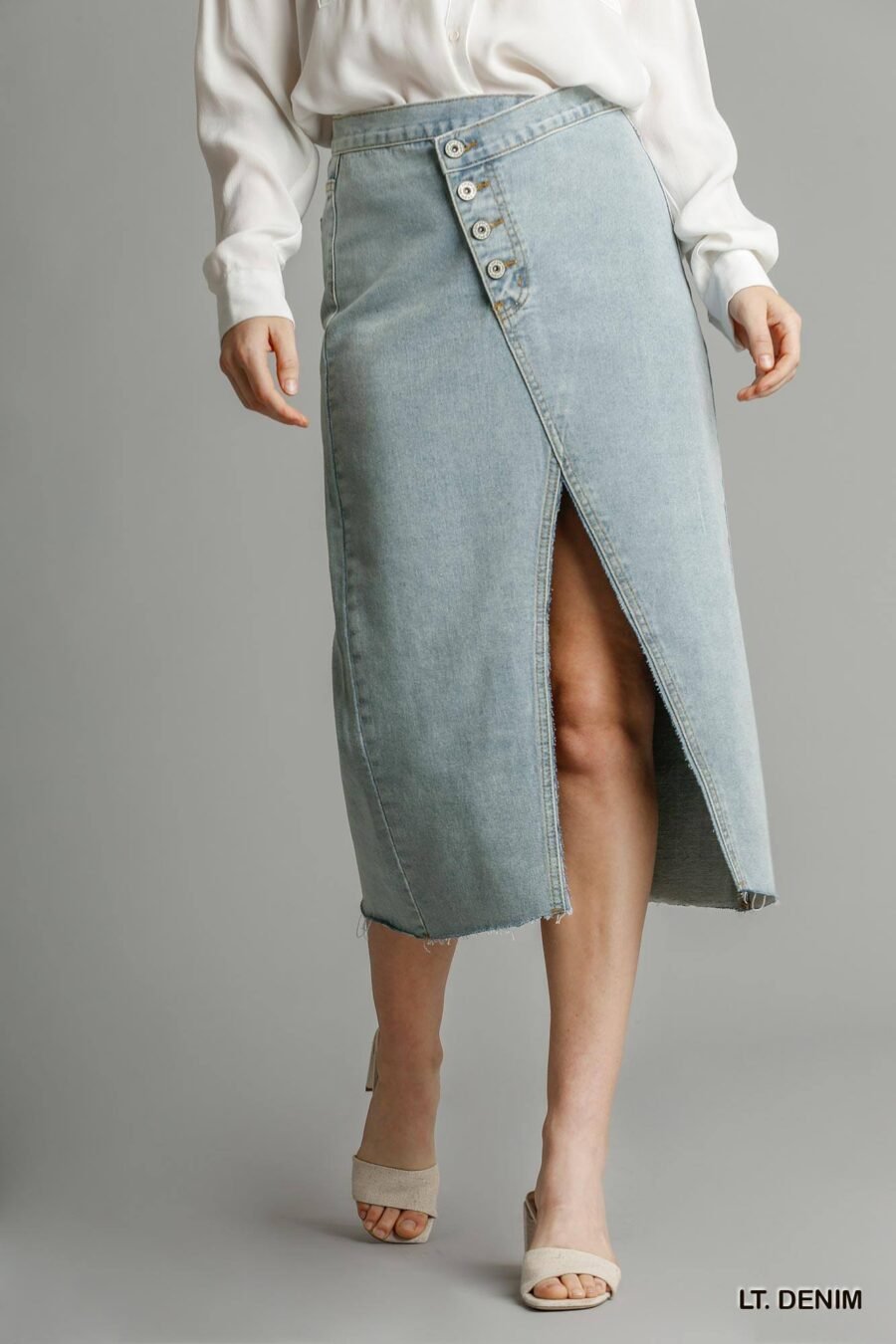 Asymmetrical waist and button up front split denim skirt with back pockets a...