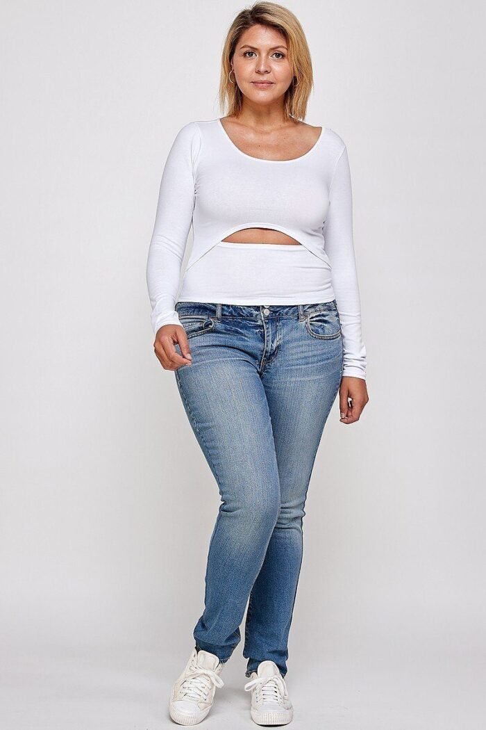 Solid round neck top, with long sleeves, and cut-out detail