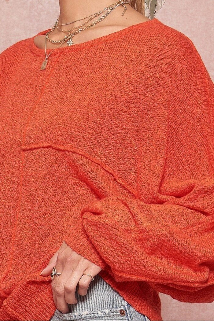 A solid knit sweater