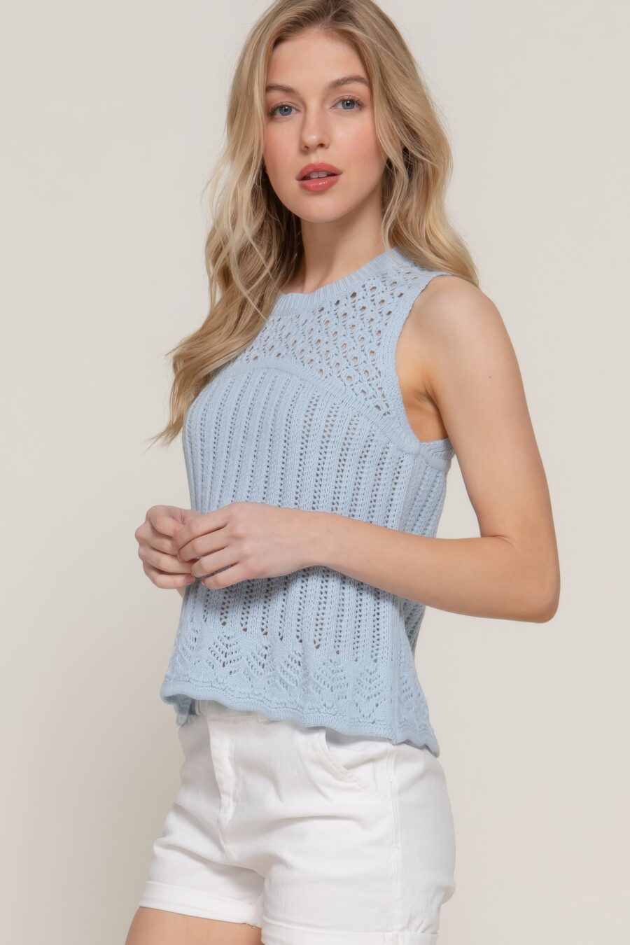 Sleeveless crochet spring sweater