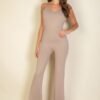 Sleeveless Wide Leg Jumpsuit, the perfect blend of comfort, style, and versatility. This trendy jumpsuit is designed with a flattering fit that accentuates your curves while maintaining a relaxed and chic silhouette.