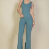 Solid Flare Leg Sports Jumpsuit, designed for those who want both style and functionality. This skin-tight jumpsuit offers an incredible 4-way stretch and breathable material